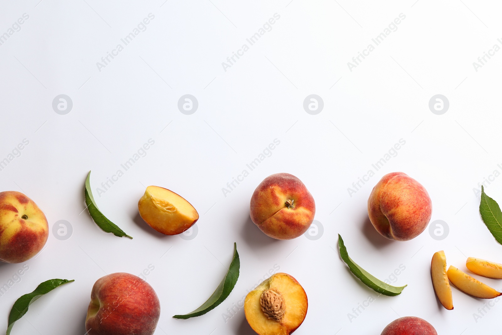 Photo of Composition with fresh peaches on white background, top view