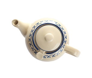 Photo of Porcelain teapot with decoration isolated on white, top view