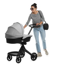 Photo of Happy young woman with baby stroller on white background