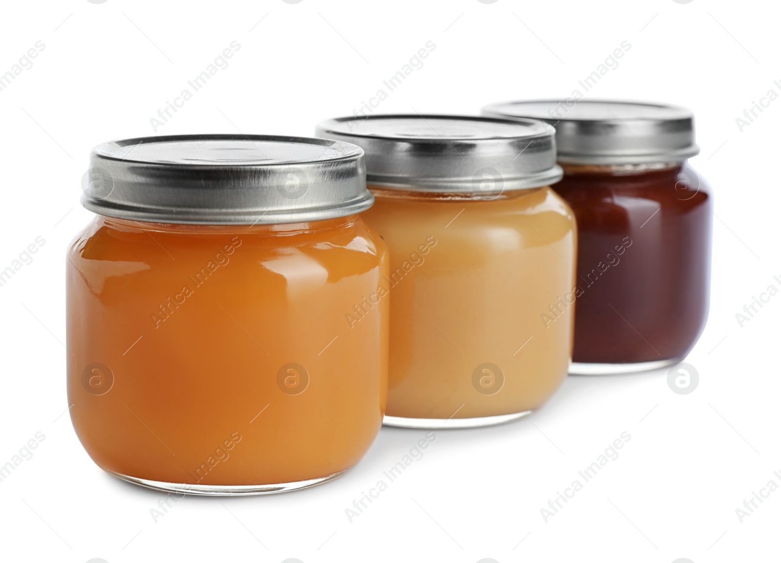 Photo of Jars with healthy baby food on white background