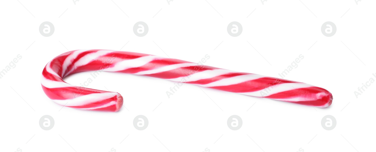 Photo of Sweet Christmas candy cane isolated on white