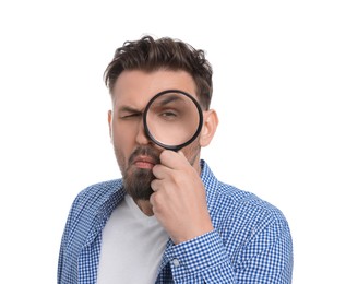 Photo of Handsome man looking through magnifier on white background