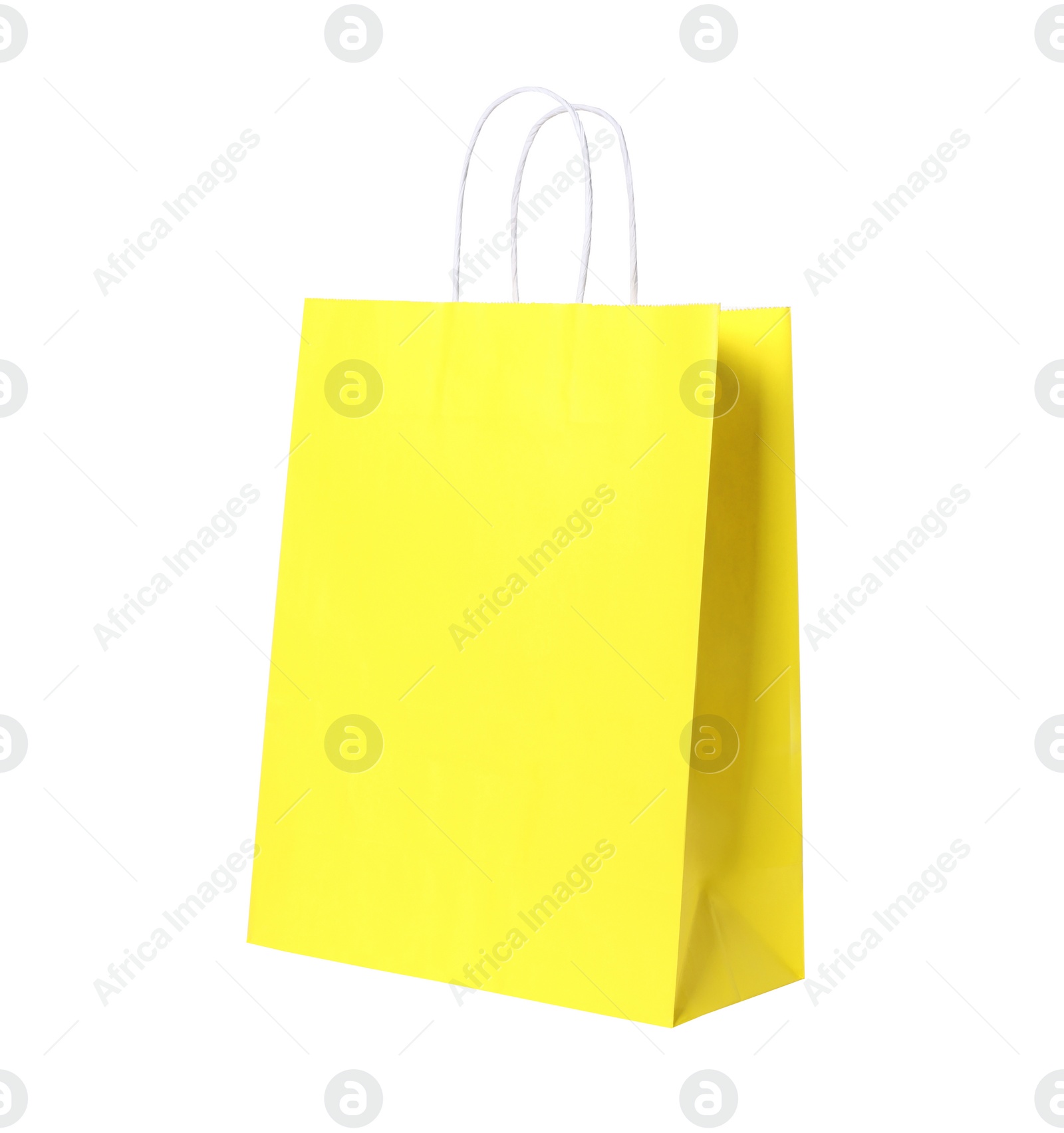 Photo of Yellow gift paper bag on white background