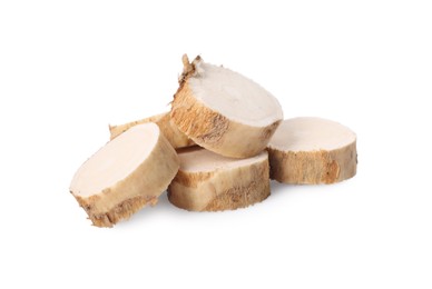 Photo of Pile of fresh horseradish slices isolated on white