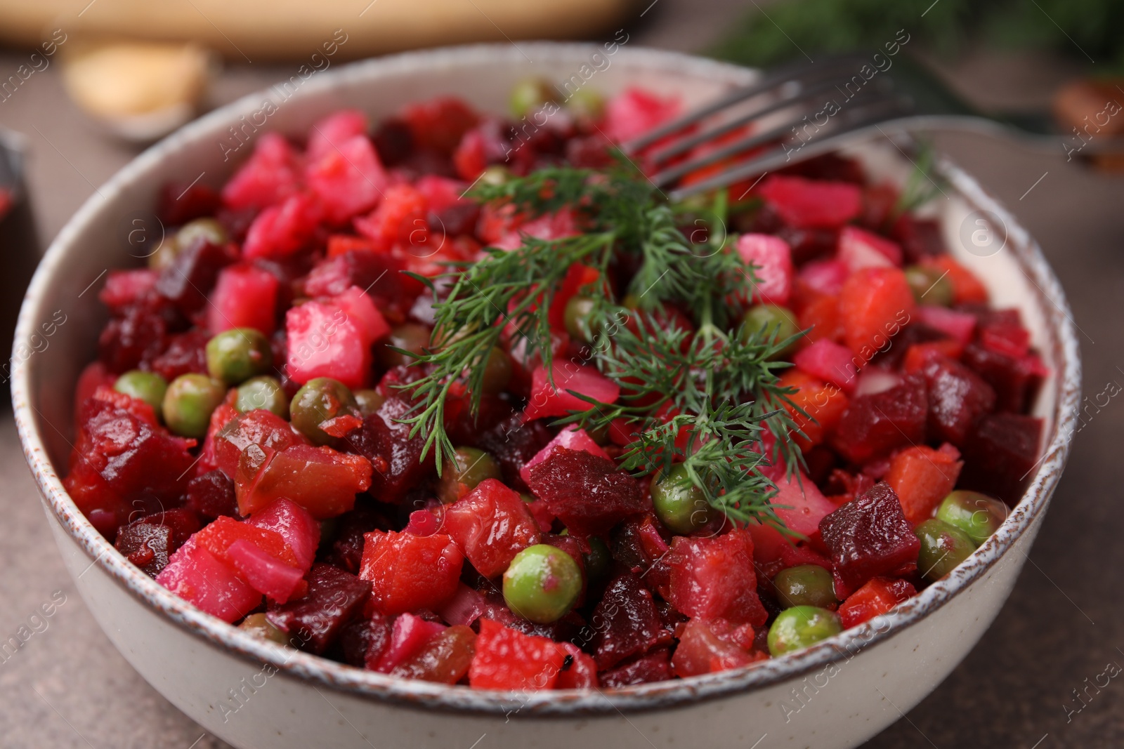 Photo of Delicious fresh vinaigrette salad in bowl, closeup