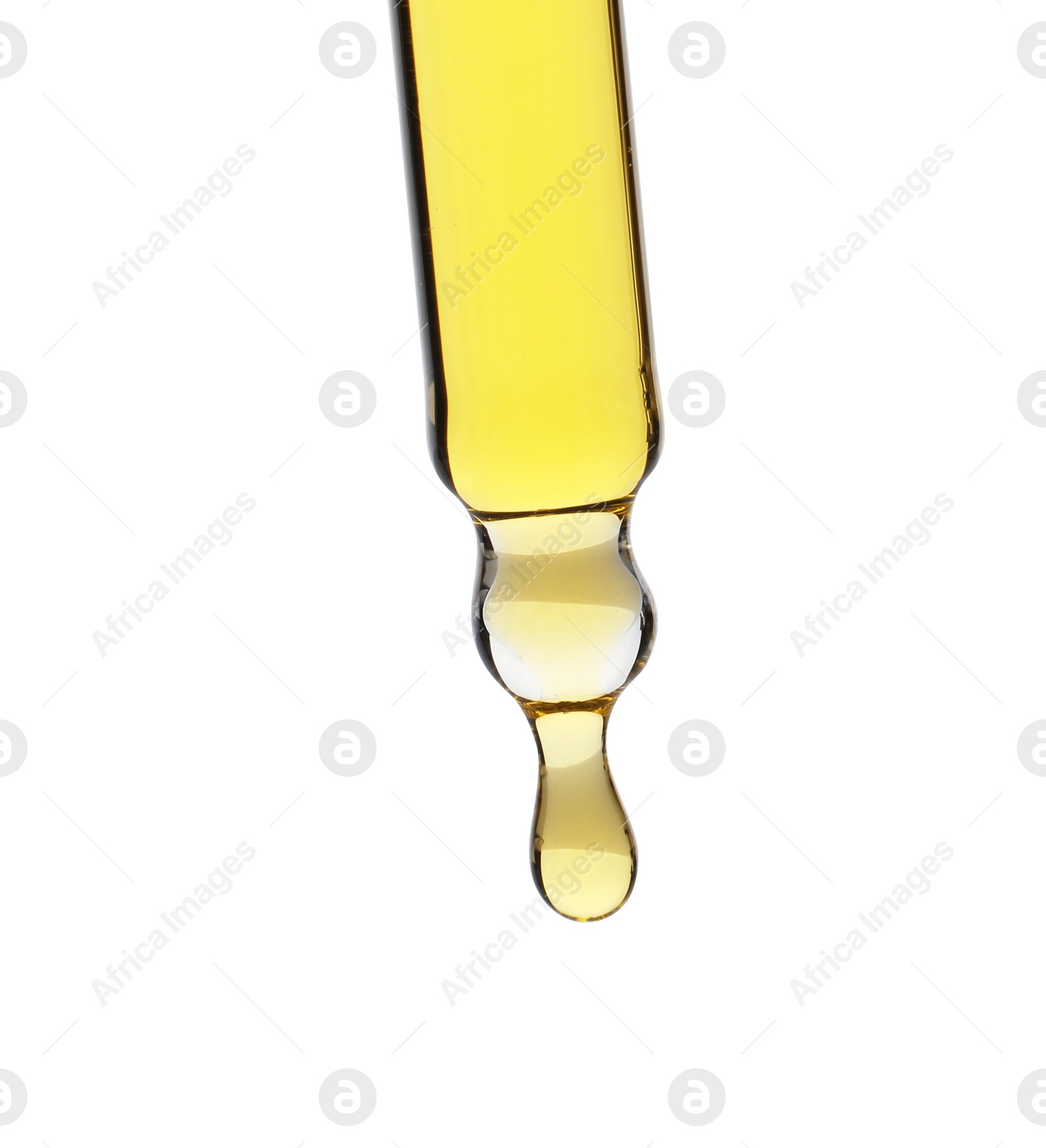 Photo of Dripping tincture from pipette isolated on white