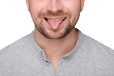 Man showing his tongue on white background, closeup