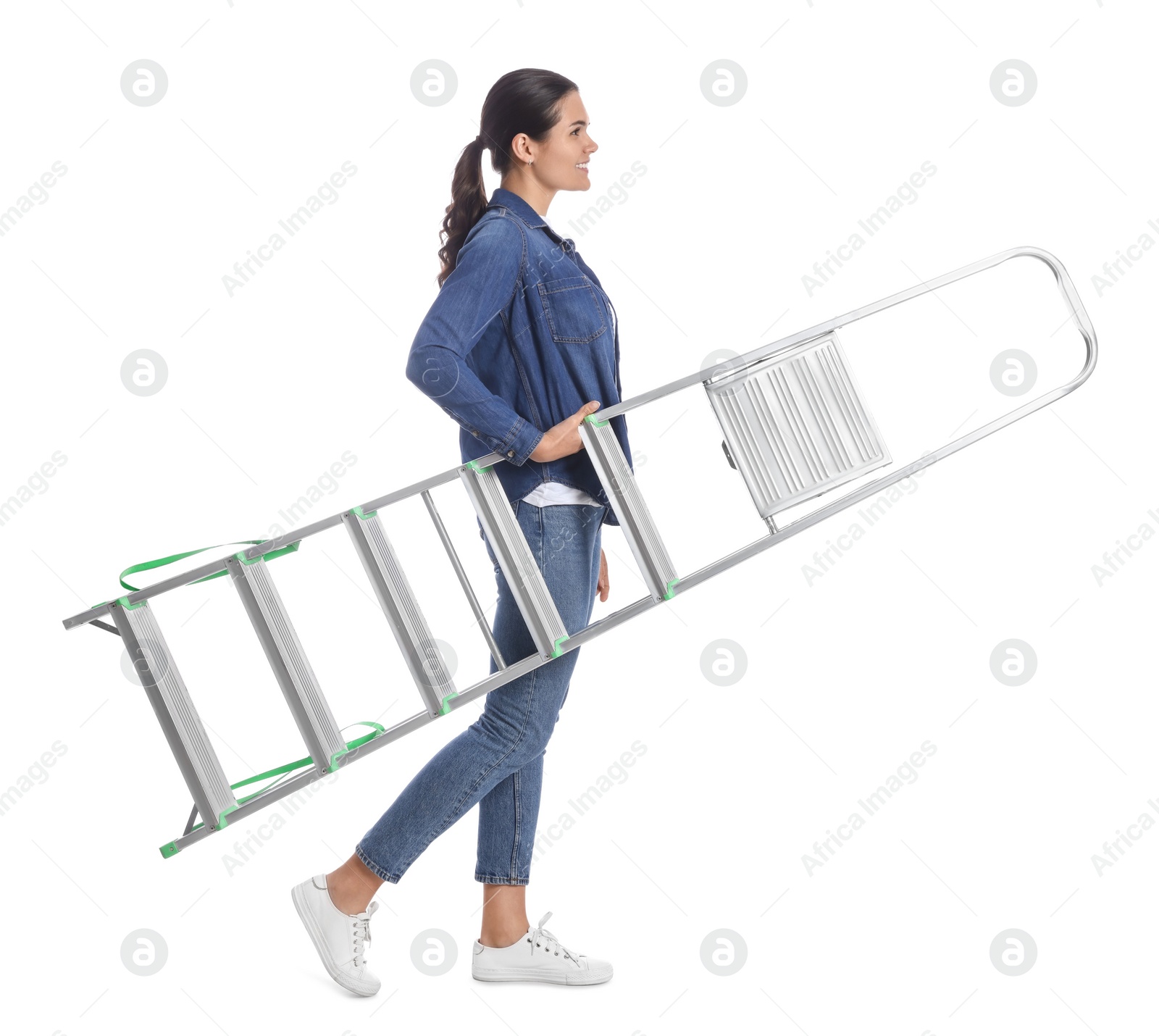 Photo of Young woman holding metal ladder on white background