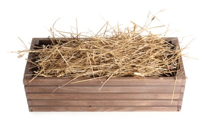 Photo of Dried straw in wooden crate isolated on white