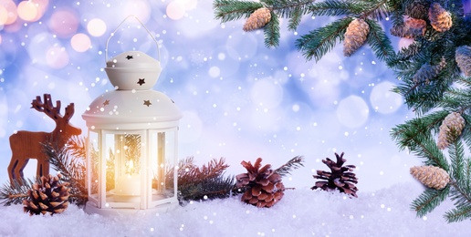 Image of Beautiful composition with vintage Christmas lantern and festive decorations on snow against color background, banner design. Bokeh effect