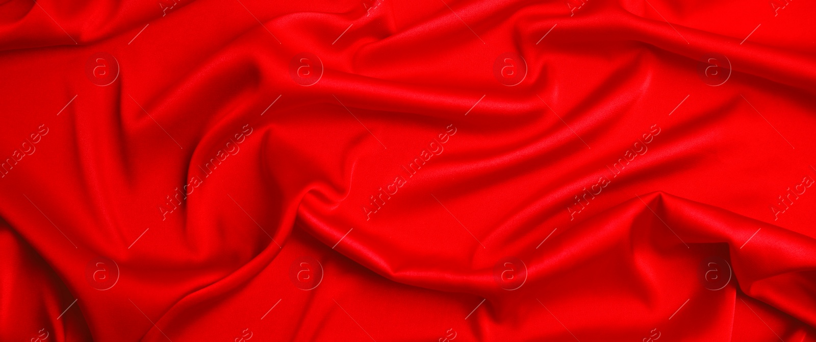 Image of Red silk fabric as background, top view. Banner design