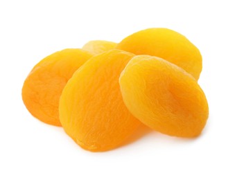 Photo of Pile of tasty apricots on white background. Dried fruits