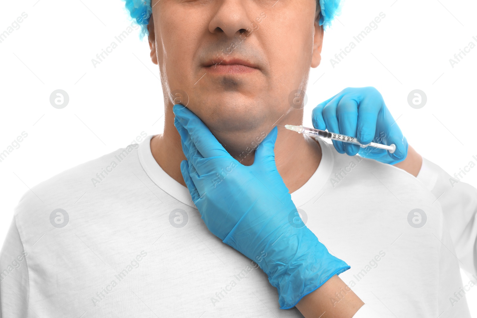 Photo of Mature man with double chin receiving injection on white background, closeup