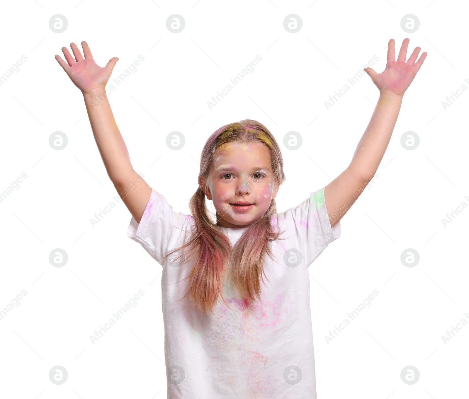 Photo of Cute little girl covered with colorful powder dyes on white background. Holi festival celebration