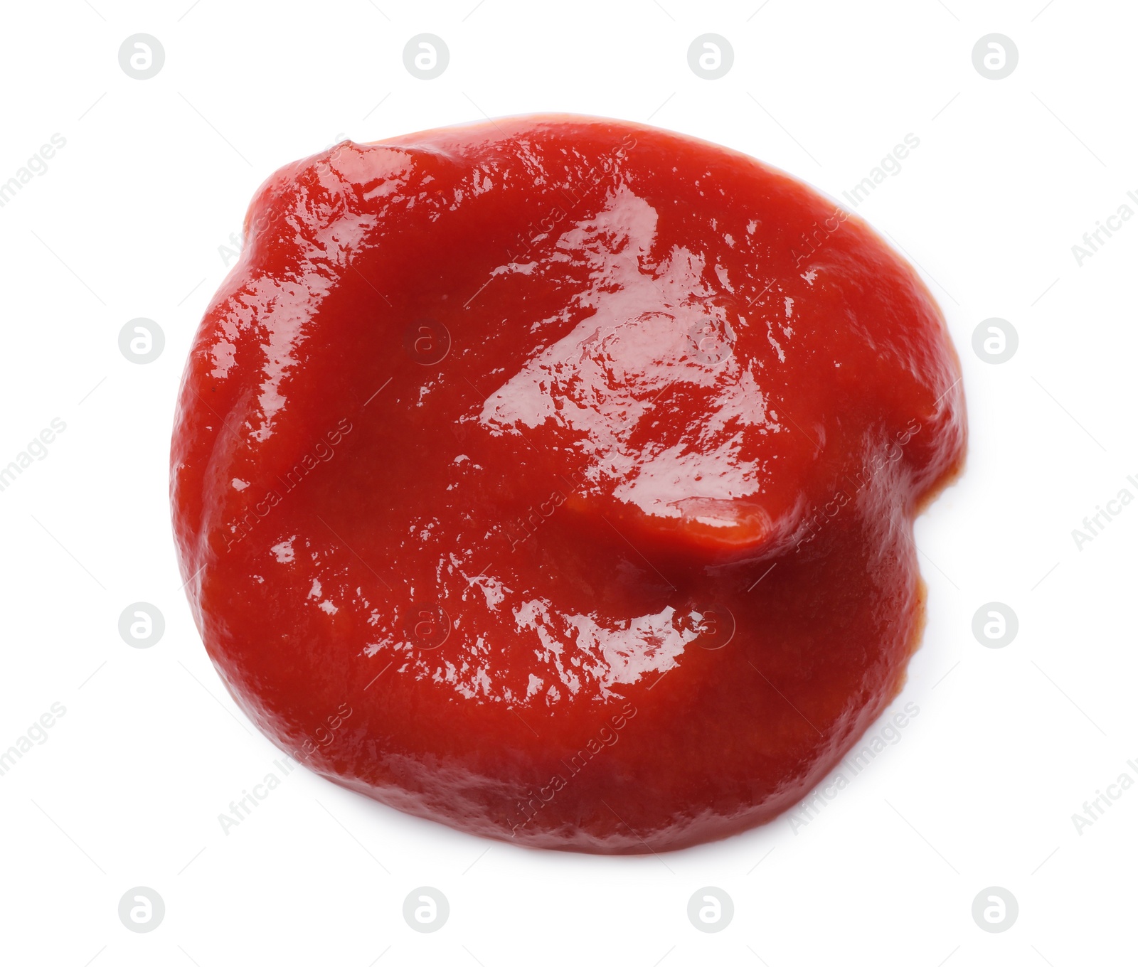 Photo of Tasty ketchup on white background, top view