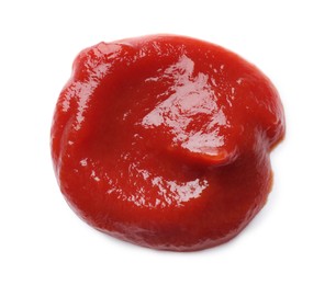 Photo of Tasty ketchup on white background, top view