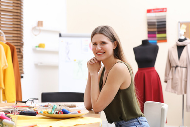 Fashion designer creating new clothes in studio