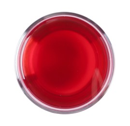Photo of Tasty cranberry juice in glass isolated on white, top view