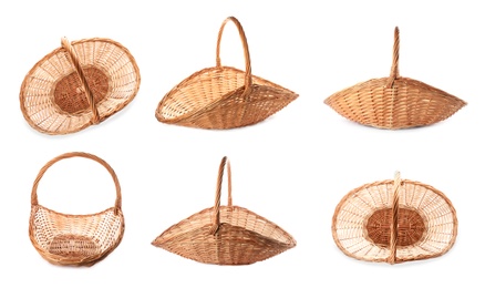 Image of Set with empty wicker baskets on white background 