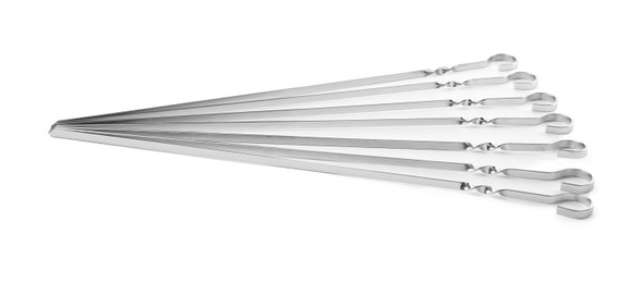 Photo of Metal skewers on white background. Barbecue utensil