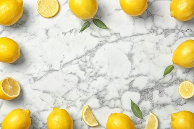 Photo of Flat lay composition with lemons on marble background