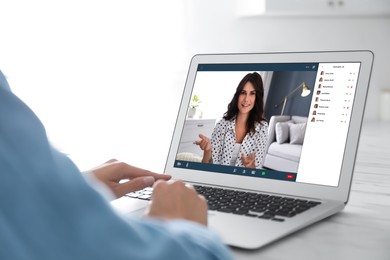 Image of Human resources manager conducting online job interview via video chat