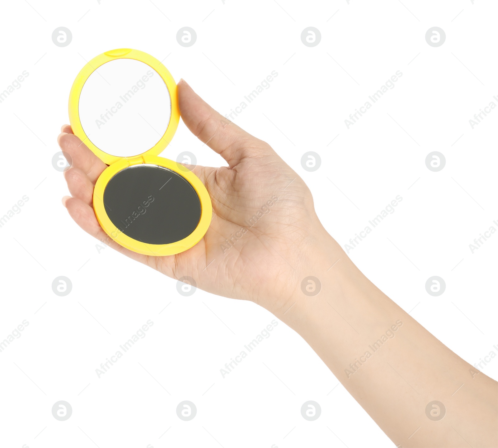 Photo of Woman holding yellow cosmetic pocket mirror on white background, closeup