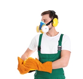 Male industrial worker in uniform on white background. Safety equipment