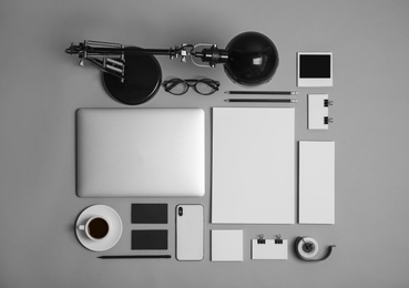 Photo of Flat lay composition with stationery on grey background. Mock up for design