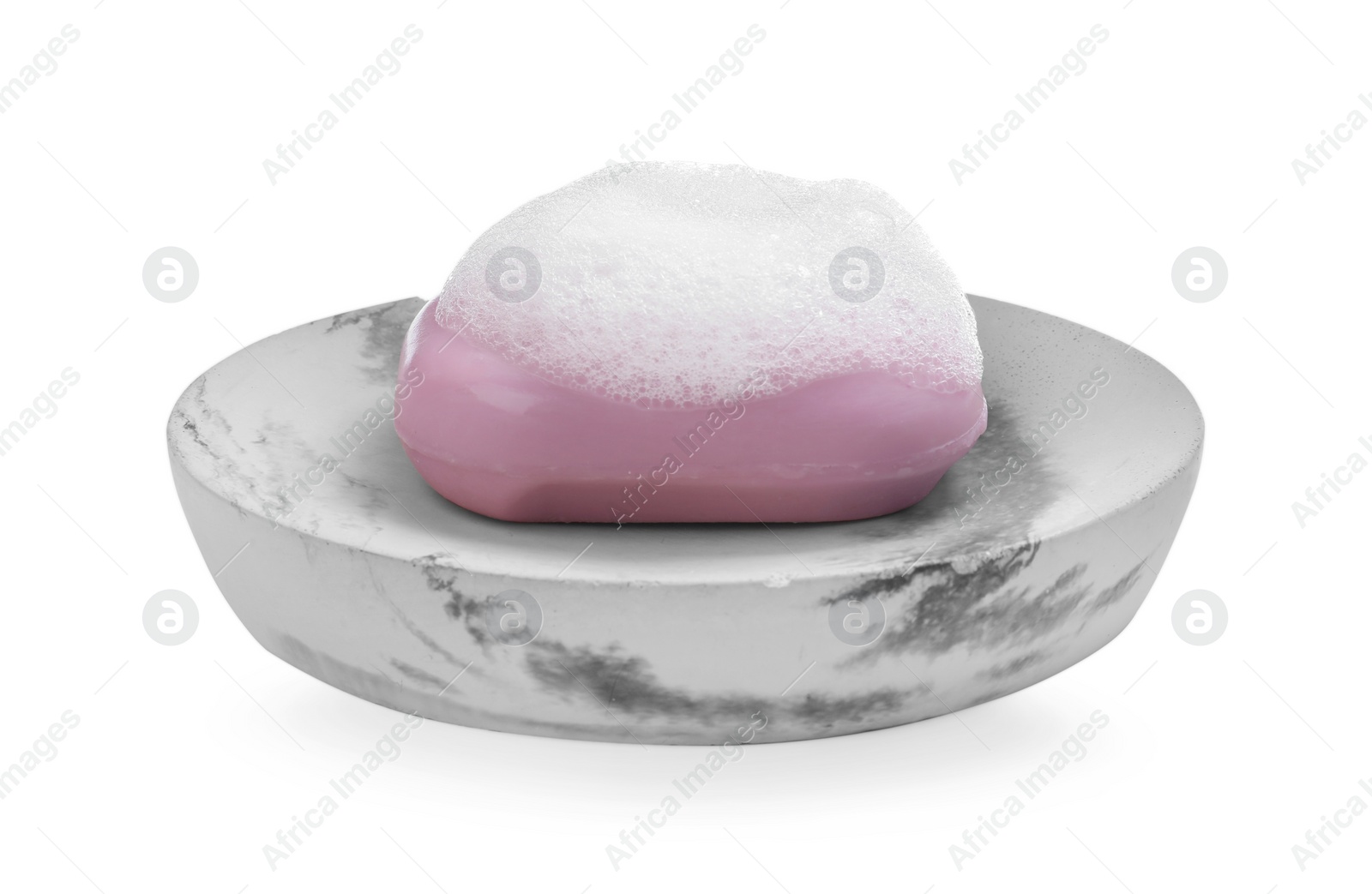 Photo of Soap bar with fluffy foam in holder on white background