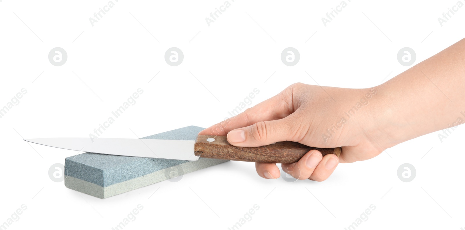 Photo of Woman sharpening knife on white background, closeup