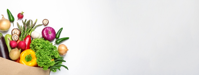 Image of Many fresh different vegetables on light background, top view with space for text. Banner design 
