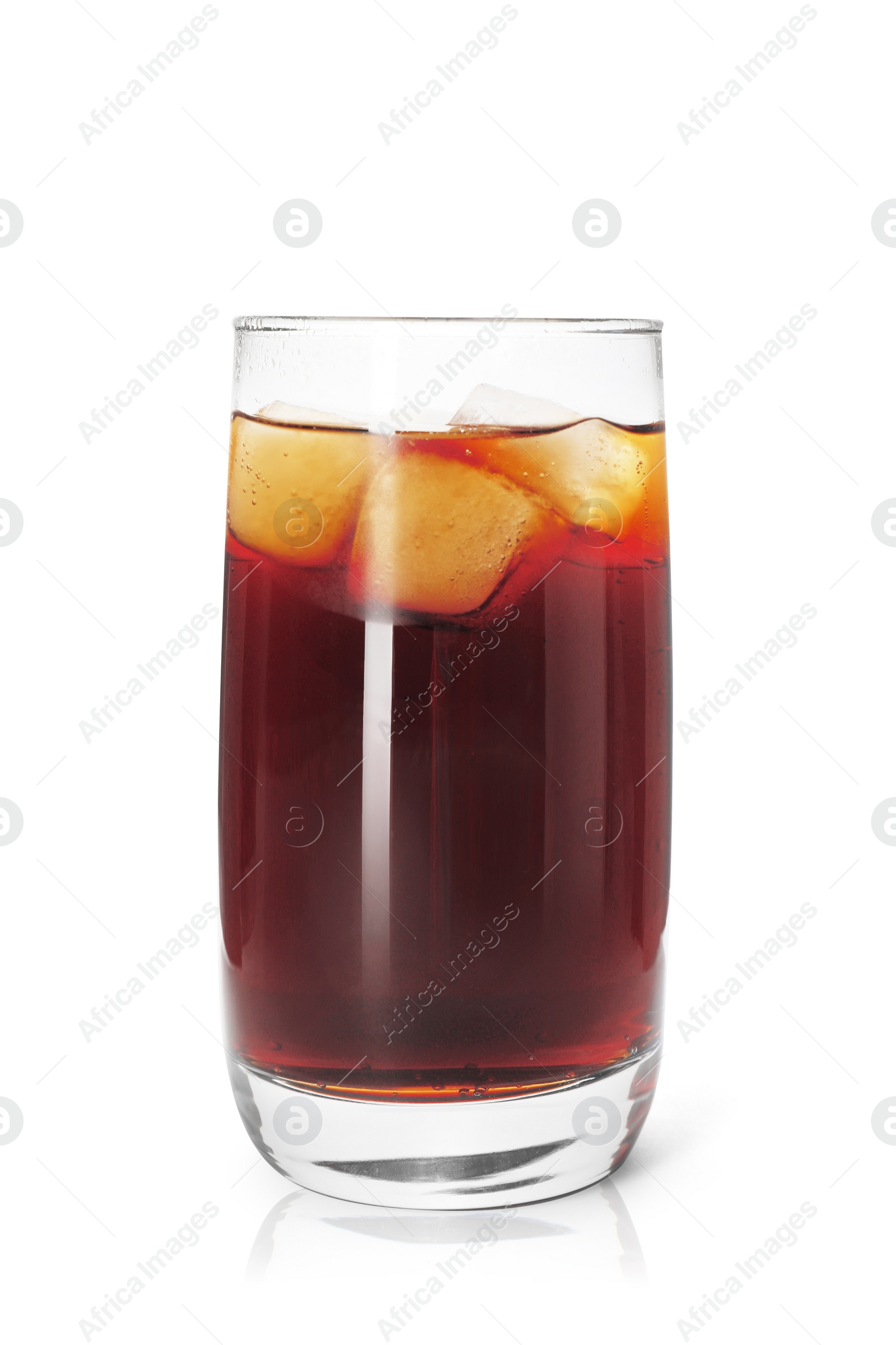 Photo of Glass of refreshing soda water with ice cubes isolated on white