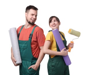Photo of Workers with wallpaper rolls and roller on white background