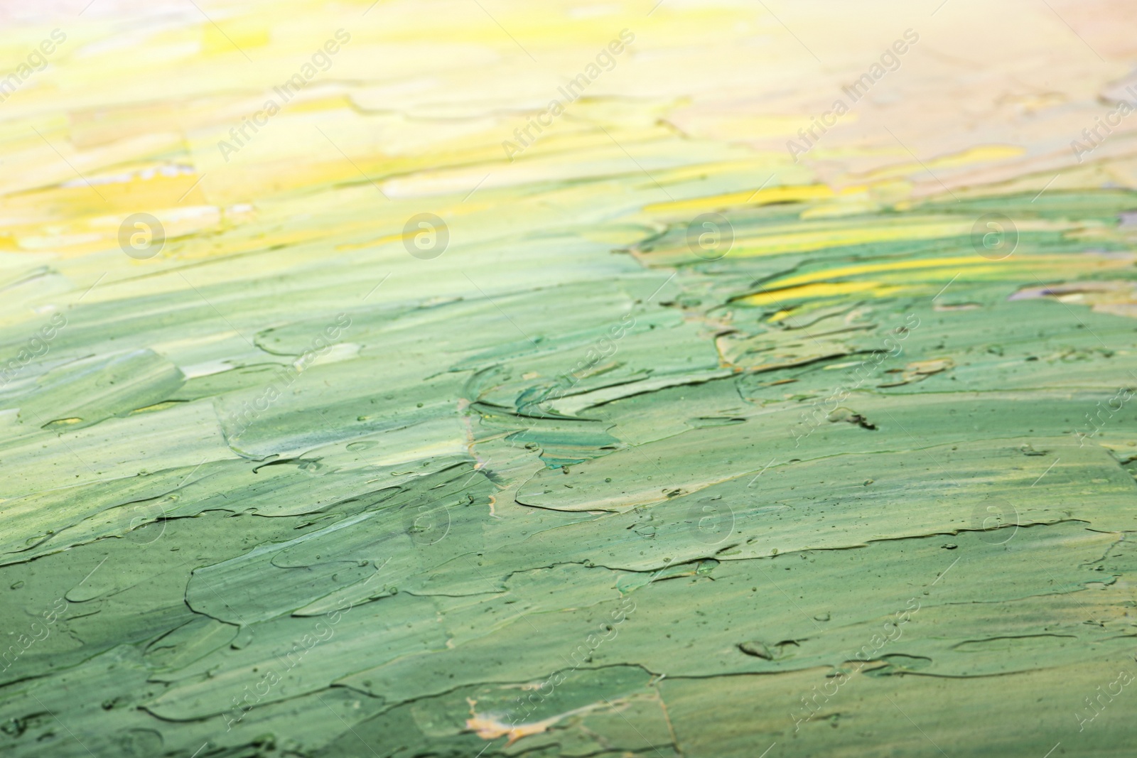 Photo of Beautiful strokes of pastel oil paints as background, closeup