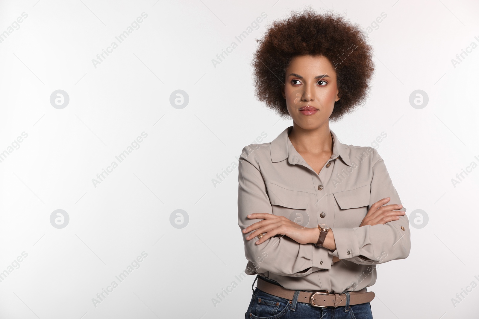 Photo of Portrait of beautiful young woman in stylish blouse on white background. Space for text