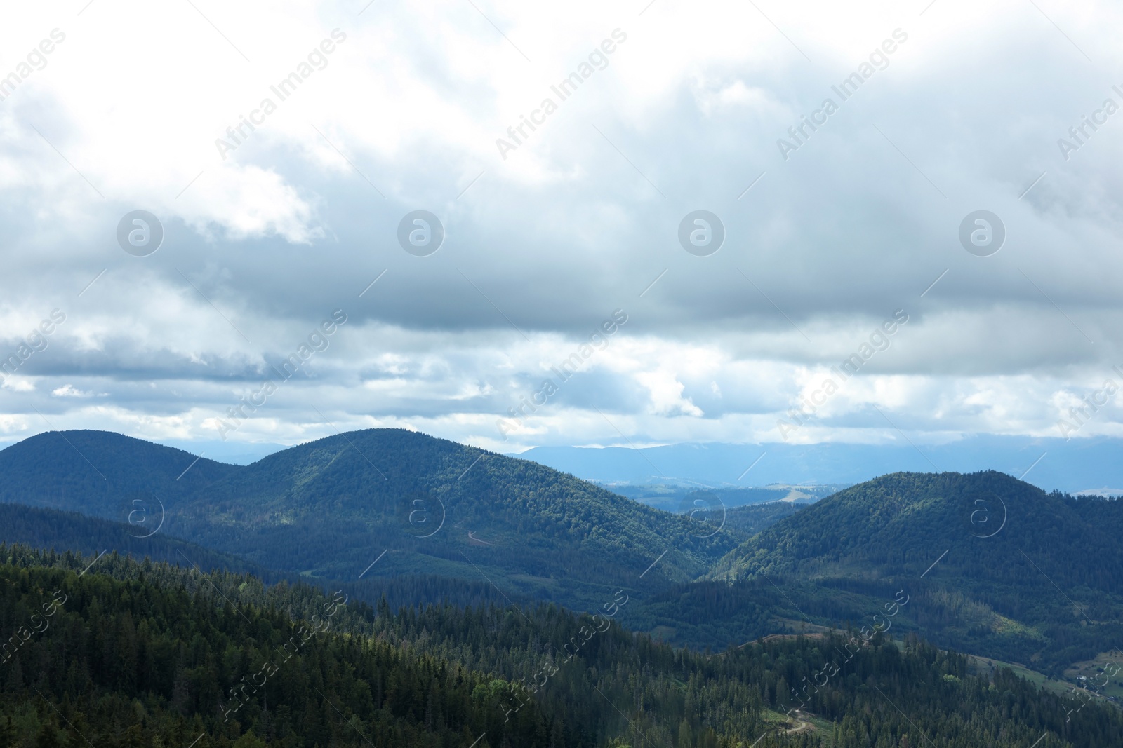 Photo of Picturesque view of mountain landscape and cloudy sky
