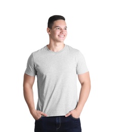 Photo of Young man in grey t-shirt on white background. Mockup for design