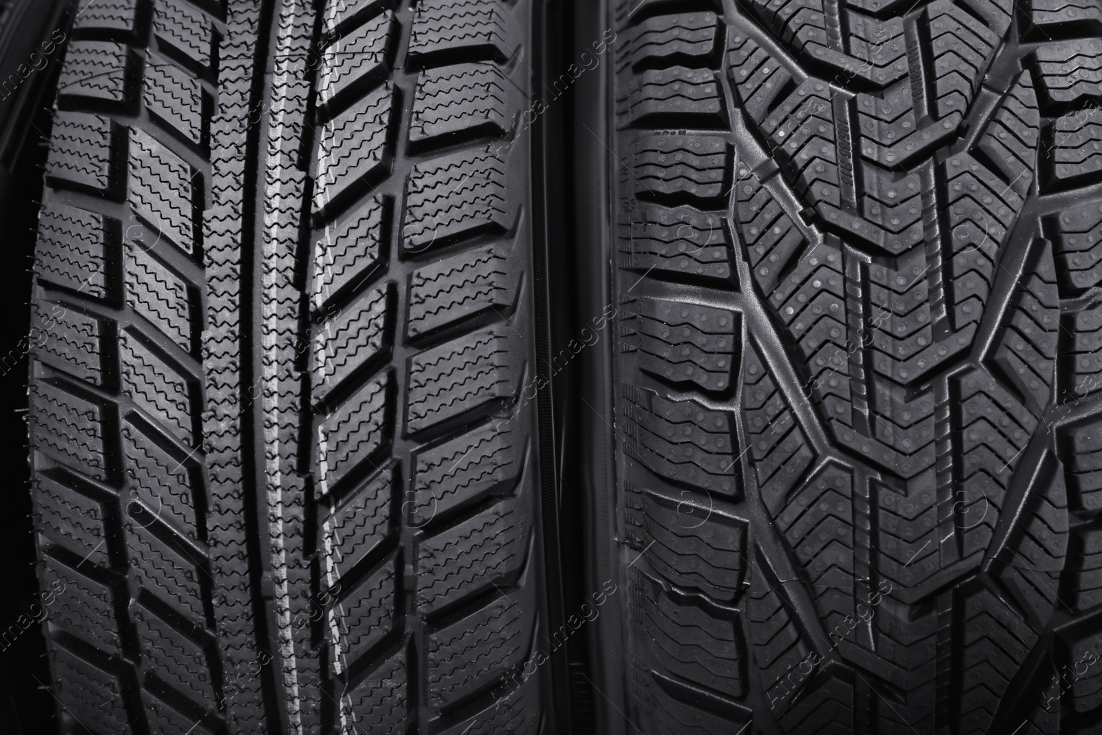 Photo of Car tires as background, closeup. Auto store