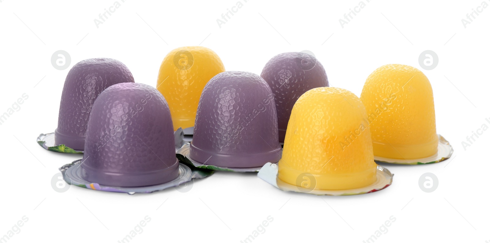 Photo of Tasty bright jelly cups on white background