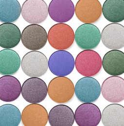 Image of Collage of beautiful different eye shadow refill pans on white background