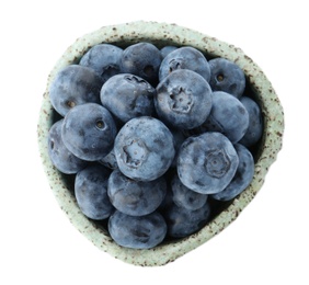 Photo of Bowl full of fresh ripe blueberries on white background, top view