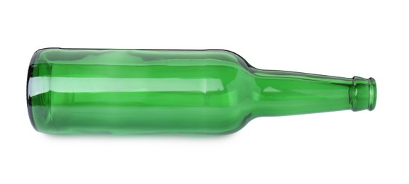 Photo of One empty green beer bottle isolated on white