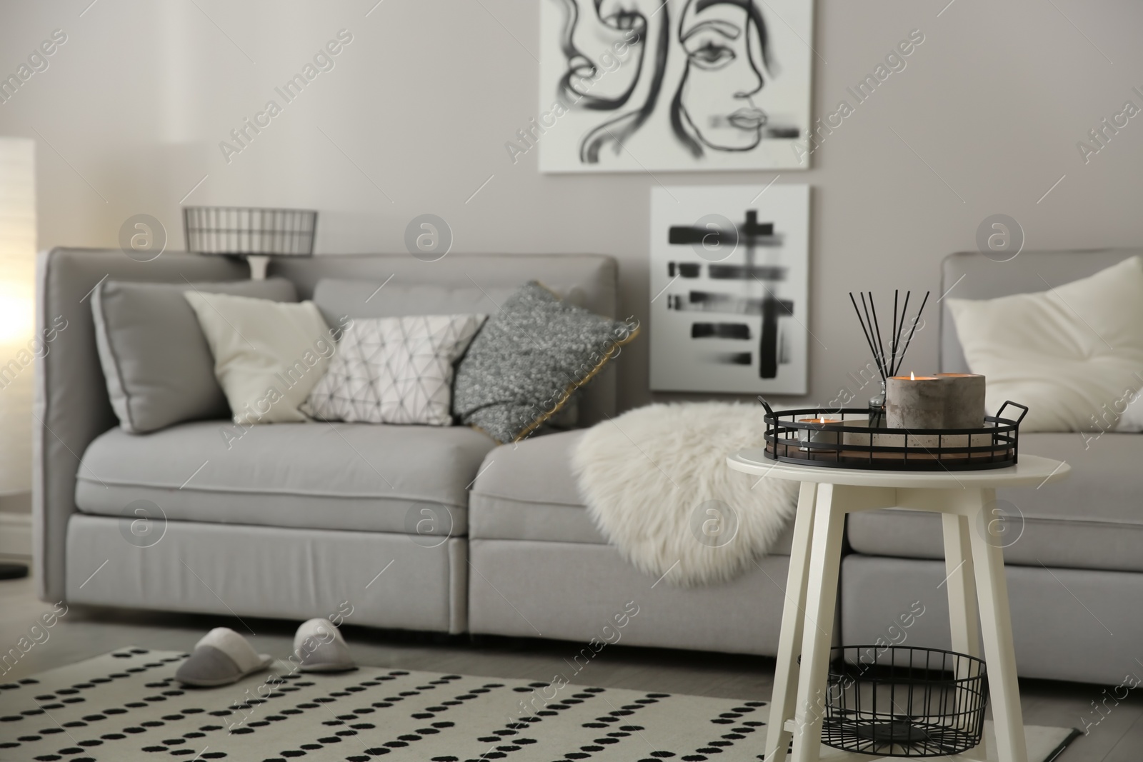 Photo of Cozy living room interior with big grey sofa