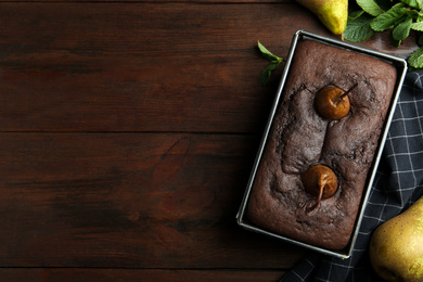 Photo of Flat lay composition with tasty pear bread on wooden table, space for text. Homemade cake