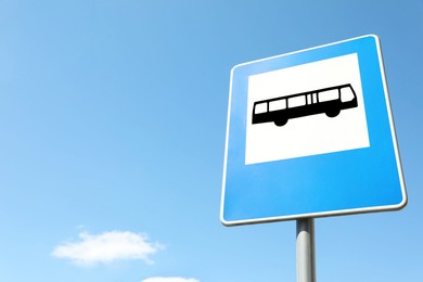 Photo of Traffic sign Bus Stop against blue sky, space for text