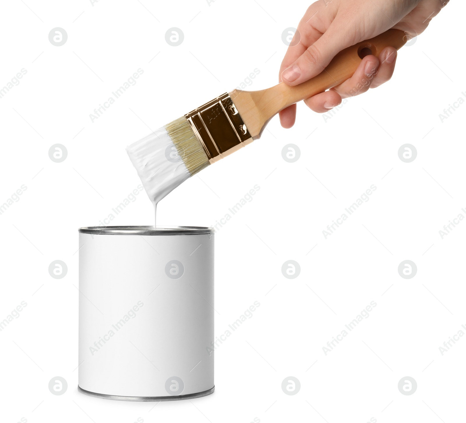 Photo of Woman holding brush over paint can on white background. Space for design