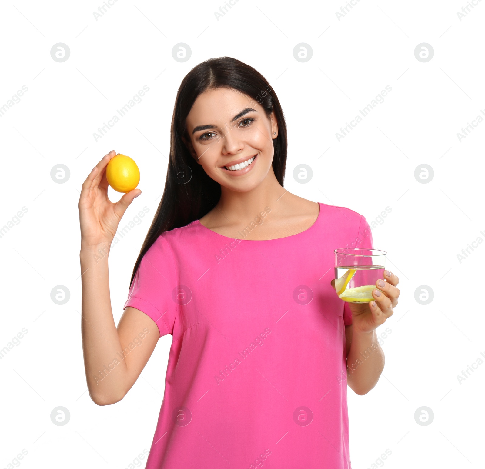 Photo of Beautiful young woman with tasty lemon water and fresh fruit on white background