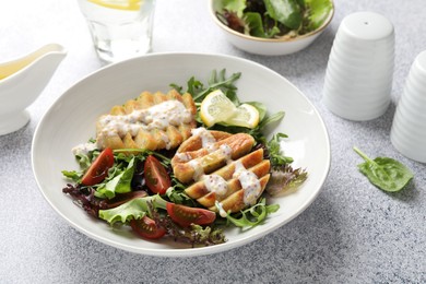 Healthy dish high in vegetable fats on light textured table, closeup