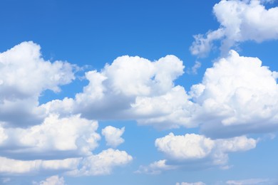 Photo of Beautiful white fluffy clouds in blue sky